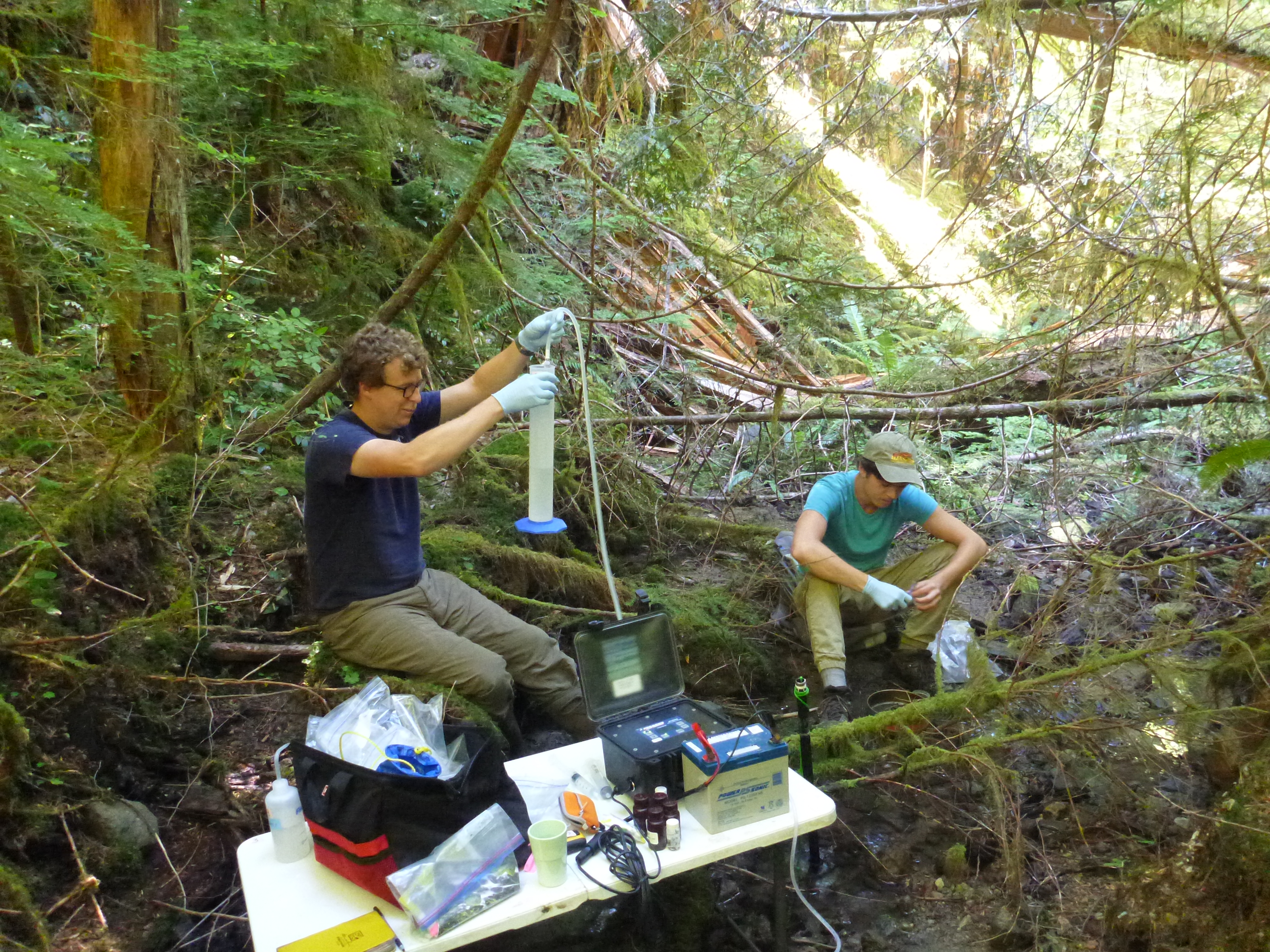 Adam Ward samples stream water