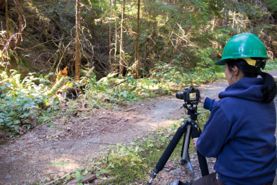 OSU PhD student, Marie Tosa, readies a camera to film release of a spotted skunk