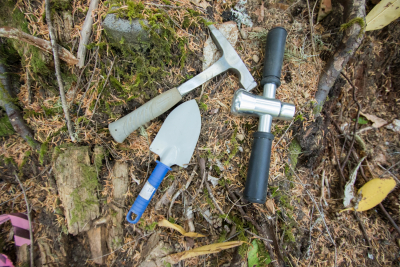 The tools of the Soil Science trade: a rock hammer ,shovel, and a bulk density corer